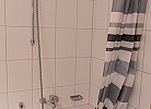 Badezimmer mit Dusche in der Ferienwohnung am Strand von Fehmarn