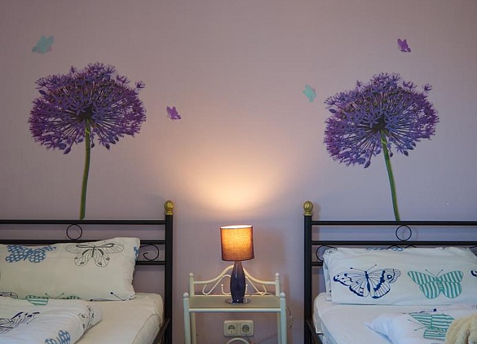 Einzelbetten im 2. Schlafzimmer in dem Ferienhaus mit Hund