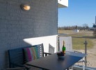 Balkon der Ferienwohnung mit Hund in Burgtiefe auf Fehmarn