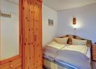 Doppelbett im Schlafzimmer der Ferienwohnung für 4 Personen am Strand von Fehmarn