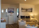 Wohnzimmer mit Blick Richtung Schlafzimmer 2 der Fewo am Südstrand