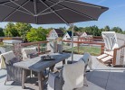 Dachterrasse mit Strandkorb in der Ferienwohnung in Burg auf Fehmarn