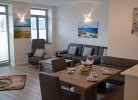 Wohnzimmer mit Essecke in der Fewo auf Fehmarn in Burg