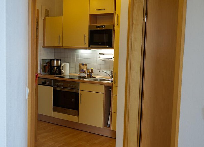 Flur Richtung Küche und Eingangsbereich der Ferienwohnung Inselblume 03 auf Fehmarn