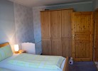 Kinderbett und Schrank in der Fewo Inselblume 15 zwischen Burgtiefe, Burg und Burgstaaken auf Fehmarn
