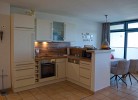 Küche und Essbereich in der Ferienwohnung in der Strandburg am Südstrand von Fehmarn