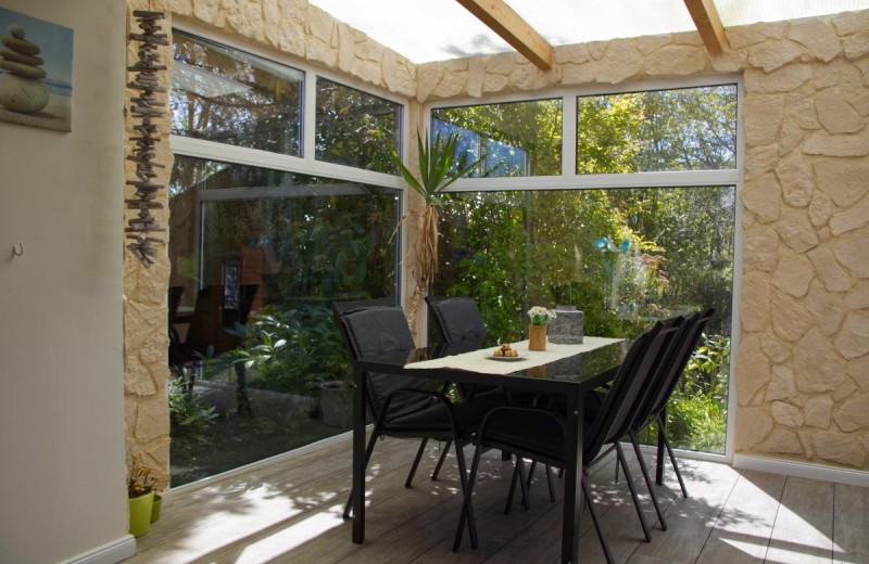 Wintergarten mit Sitzgelegenheiten in der Fewo in Burg auf Fehmarn für 4 Personen