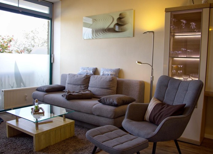 Wohnzimmer in der Ferienwohnung Inselblume 48 am Südstrand auf Fehmarn