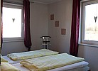 Doppelbett für 2 Personen im Schlafzimmer vom Ferienhaus auf Fehmarn
