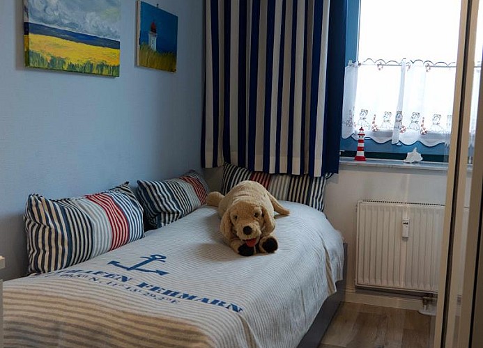 Einzelbett in der Ferienwohnung direkt am Südstrand von Fehmarn in Burgtiefe