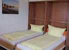 Aufgeklappte Schrankbetten in der Ferienwohnung Inselblume 03 auf Fehmarn