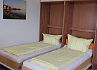 Aufgeklappte Schrankbetten in der Ferienwohnung Inselblume 03 auf Fehmarn