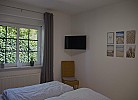 TV im Schlafzimmer der Fewo in Burgstaaken auf Fehmarn