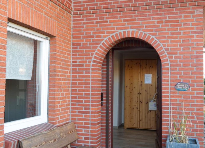 Eingang zur Ferienwohnung mit Hund in Landkirchen auf Fehmarn