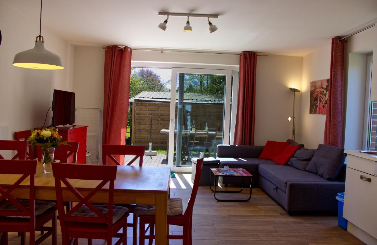 Wohnzimmer mit Esstisch in der Inselblume 28  in Burg auf Fehmarn