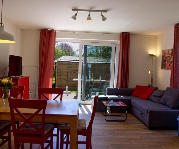 Wohnzimmer mit Esstisch in der Inselblume 28  in Burg auf Fehmarn
