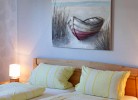 Doppelbett im Schlafzimmer für 2 Personen in der Fewo Inselblume 15 auf Fehmarn