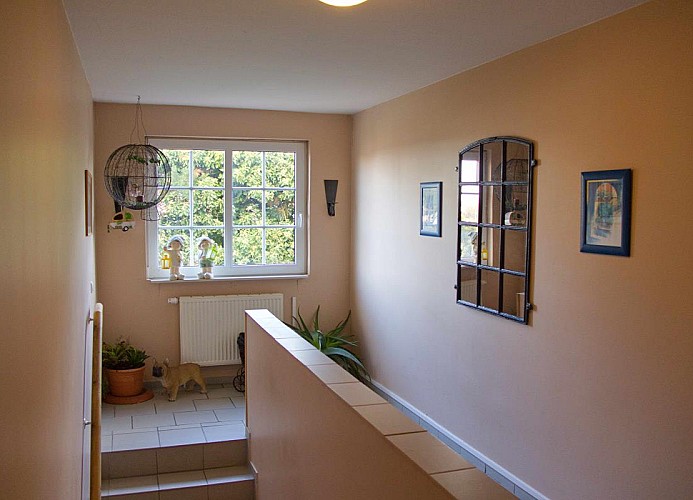 Treppe zur 1. Etage und zur Inselblume 63