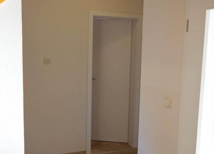 Flur Richtung Schlafzimmer 1 und 2 sowie Badezimmer in der Fewo auf Fehmarn