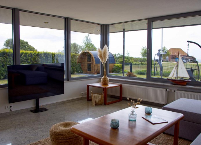 Wohnzimmer der Inselblume 82 mit Blick auf das Meer