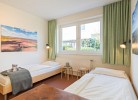 Einzelbetten in der Ferienwohnung in Burg für 4 Personen