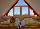 Einzelbetten im Schlafzimmer im Dachgeschoss der Inselblume 27