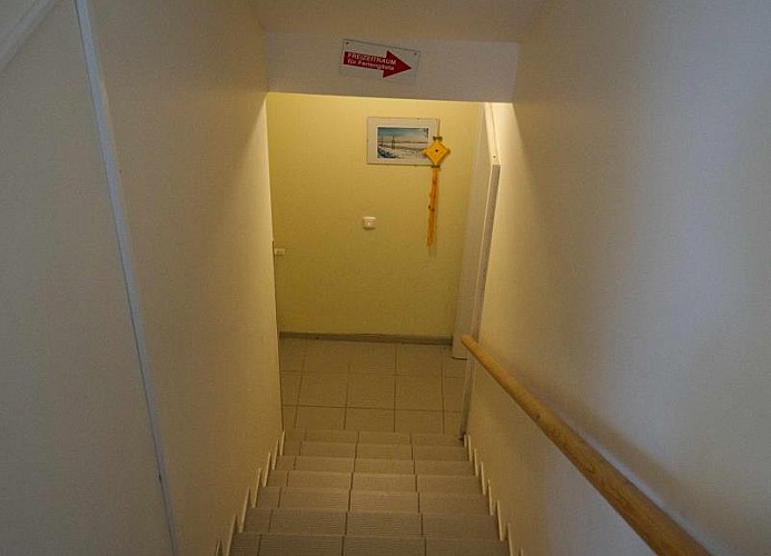 Treppe zum Spielraum im Keller der Ferienwohnungen