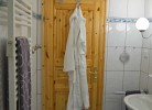 Handtuchheizung und Tür zum Badezimmer der Ferienwohnung Inselblume 15