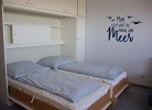 Doppelbett in der Ferienwohnung für 2 Personen am Südstrand auf Fehmarn